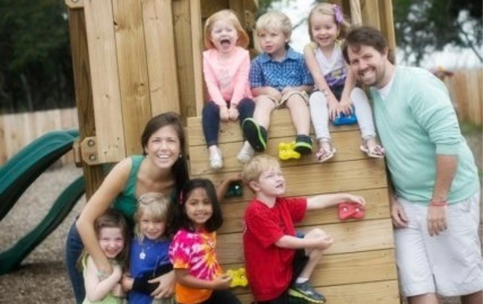 Lauren Boyle with children on the Lupine Lane playground